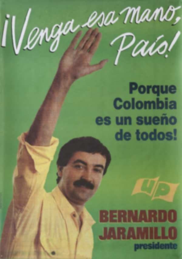 Afiche verde de Bernardo Jaramillo con la mano levantada y el lema «¡Venga esa mano, país!».